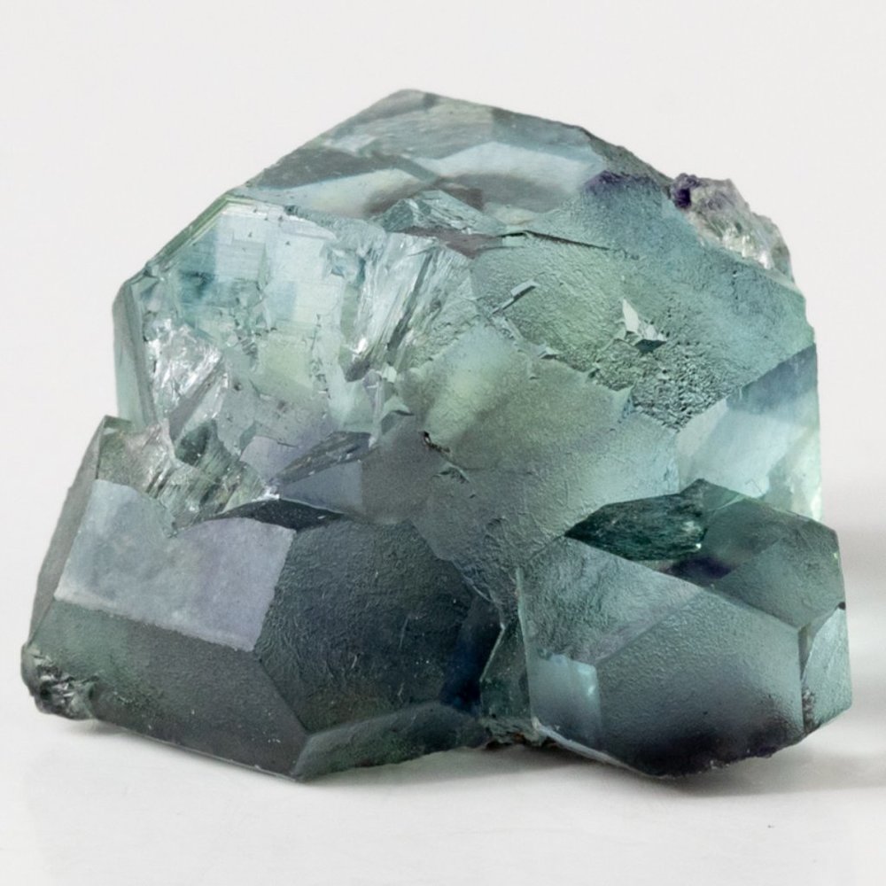 Rare AAA gemmy green fluorite with dark purple phantom cube